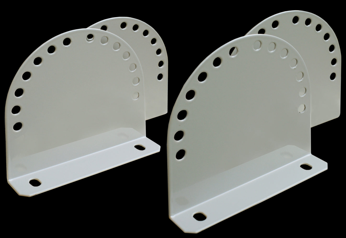 Two metallic TILTABLE brackets with circular perforations on a black background