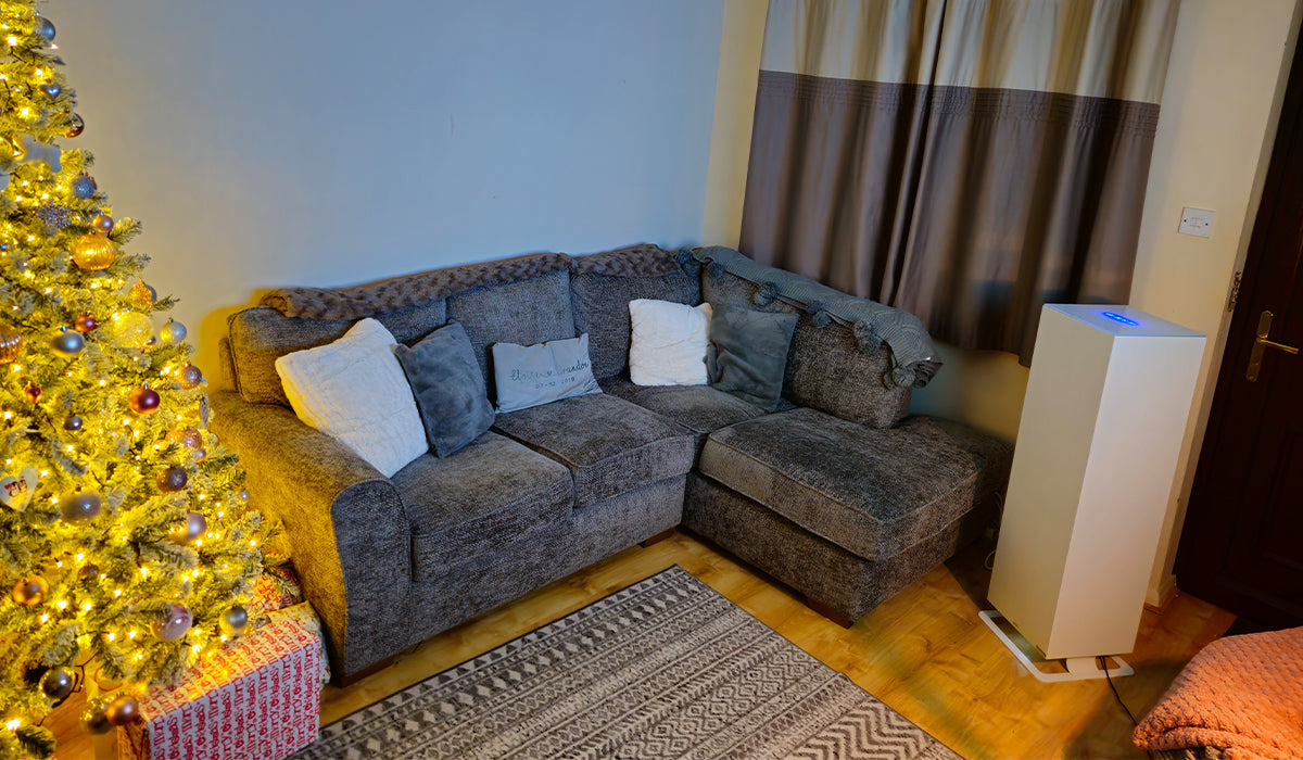 Energy efficient tower heater with Alexa compatibility. Livingroom setting