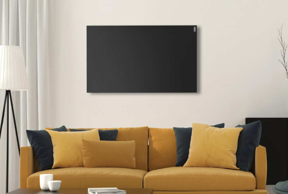 Infrared heating panel mounted on wall in modern UK home