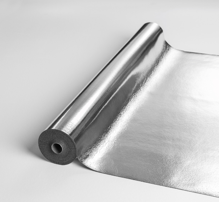 Roll of silver reflective underlay on a light gray background