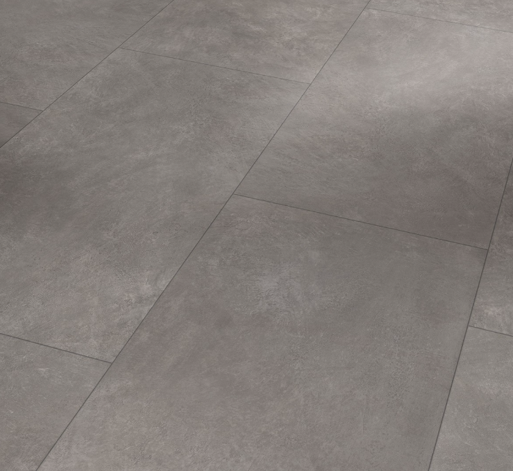 Close-up of gray oversized laminate tiles with a slight texture