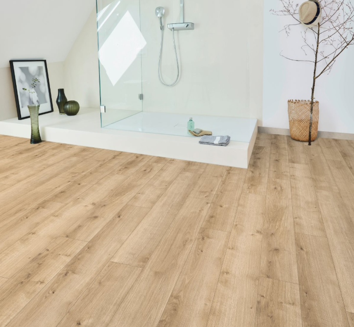 Parador Modular ONE Oak Pure Light wide plank flooring in modern bathroom with a glass shower enclosure.