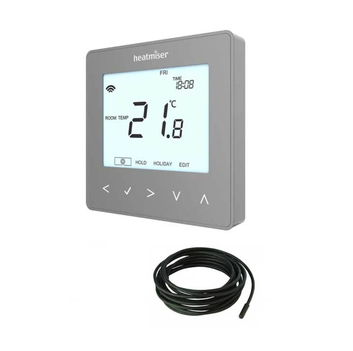 Digital thermostat with cable on a white background