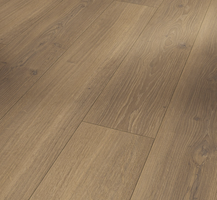 Close-up of Oak Studioline honey laminate flooring with a brown finish