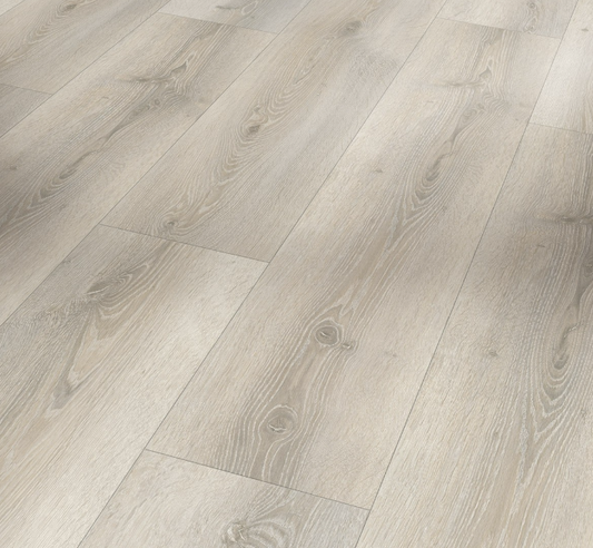 Close-up of a wooden floor with a light gray finish