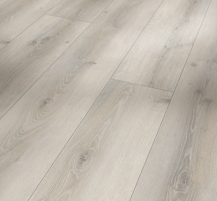 Side view of a wide white limed laminate floor