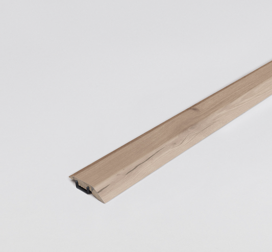 A light wood/grey colored floor profile on a light gray background