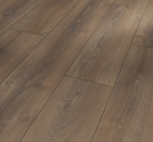 An angled view of Paradors trendtime 6 laminate flooring in a medium brown