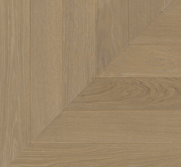 Close-up of wooden flooring with a chevron pattern
