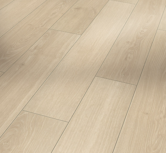 Close-up of a wooden floor with a wide plank pattern