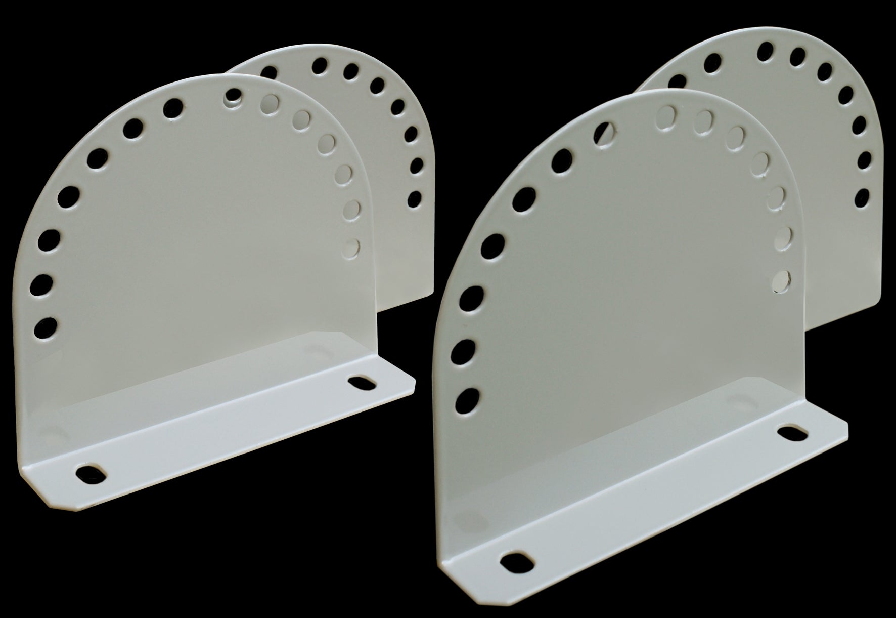 Two metallic TILTABLE brackets with circular perforations on a black background