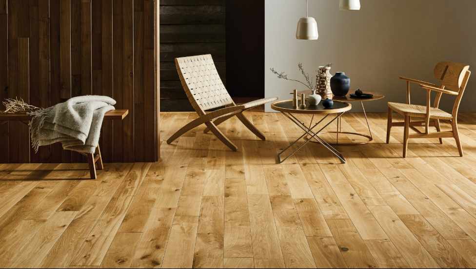 Energy-efficient home interior with wooden flooring, emphasizing warmth and sustainable heating solutions