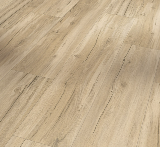 Slanted view of a wooden floor with a natural finish