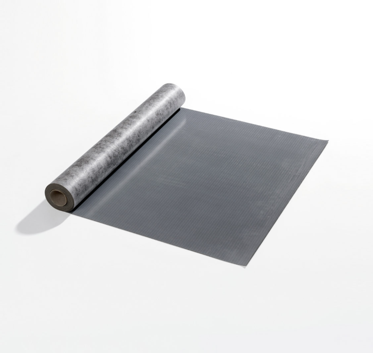 Roll of gray self adhesive underlay on a white background