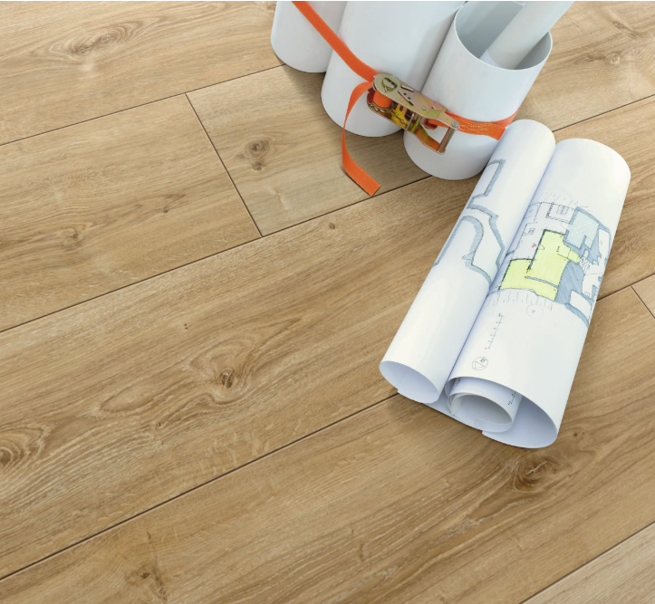 Oak Nova Light Limed laminate Wooden flooring with rolls of plans on top