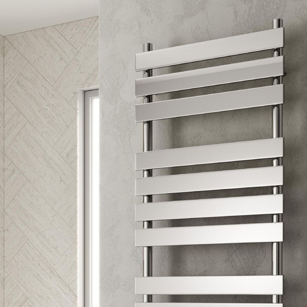 Metal towel radiator mounted on a wall in a bathroom setting