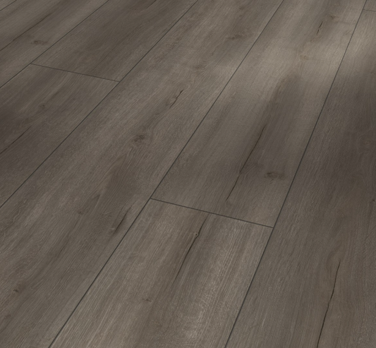 Close-up of the vivid textured surface on Parador Oak Loft Smoked White Oiled laminate flooring.